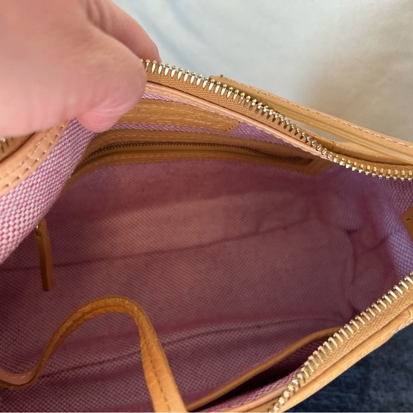 Dooney and Bourke Bag . Medium sized. Has imperfections . - Picture 12 of 17